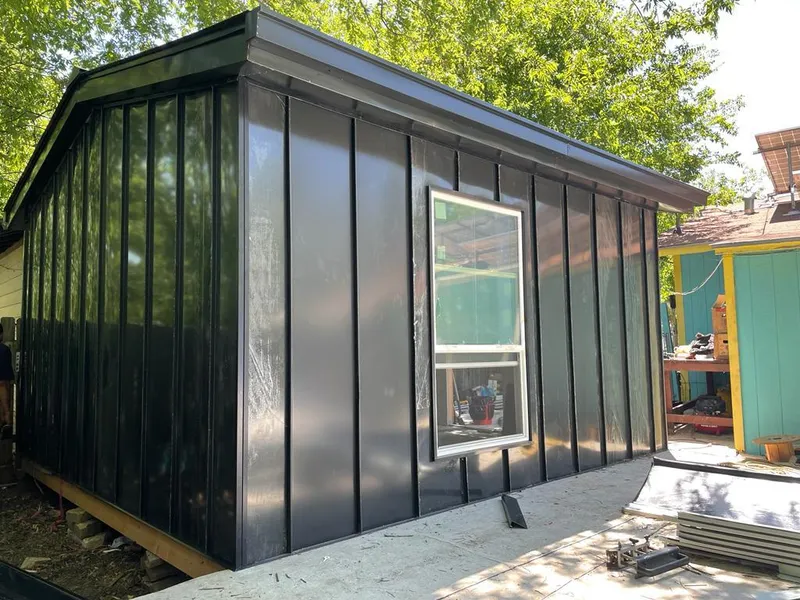 Black standing seam metal wall panels for Roof Inspection in Scriba