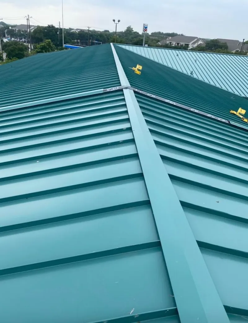 Green commercial metal roof ridge and valley for Metal Roof Repair in Scriba